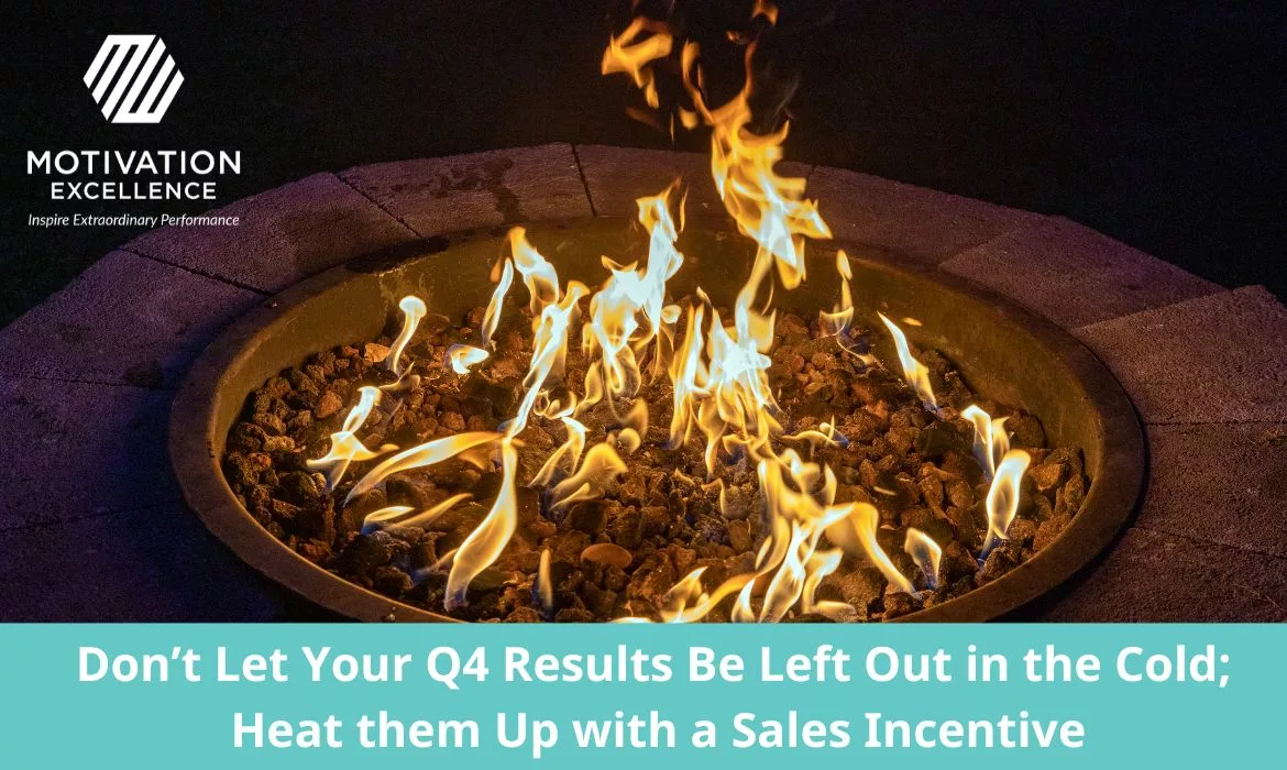 An outdoor firepit with orange flames.